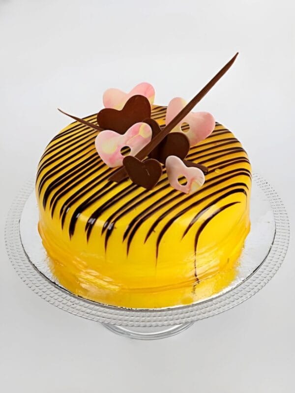 Chocolate Garnished Mango Cake